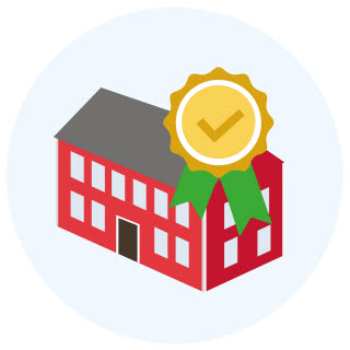 Hus med medalj.