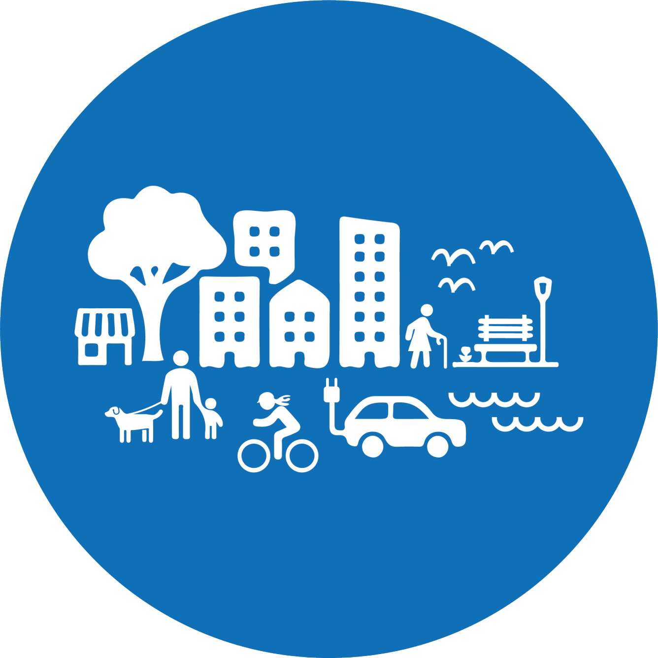 Blå cirkel som visar stad med olika typer av hus och byggnader, bilar människor, djur, träd, vatten och busshållplats.